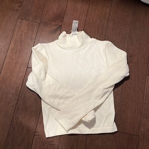Woman’s Zara turtleneck top